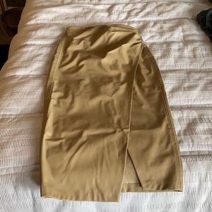 Never worn, without tags. Cream faux leather wrap midi skirt